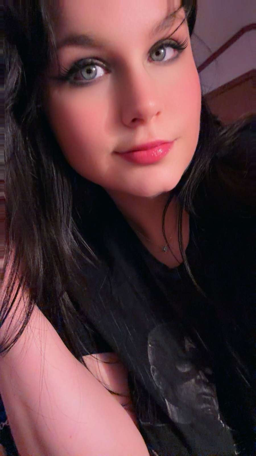 Blue-eyed brunette Pittsburgh companion in an up-close portrait